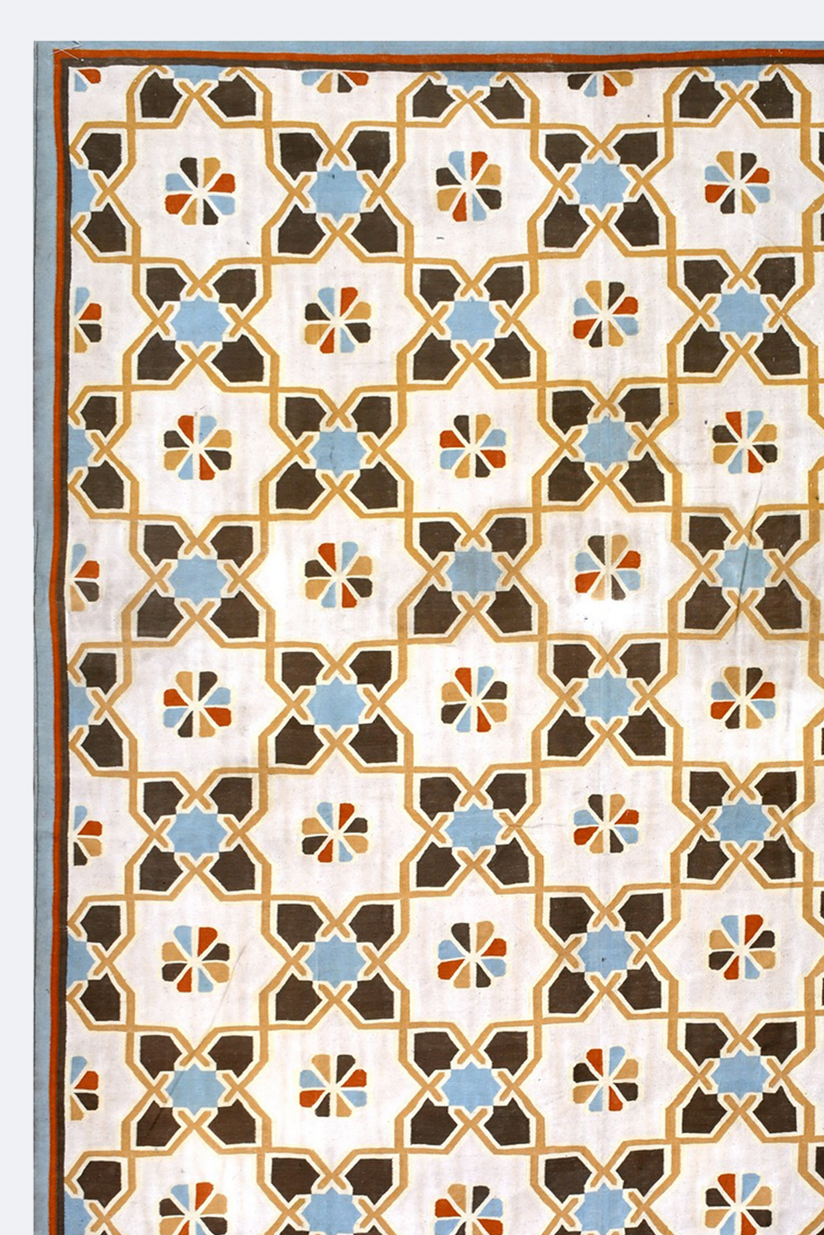 Beige Cotton Handwoven Rug with Blue and Brown Geometric Floral Pattern
