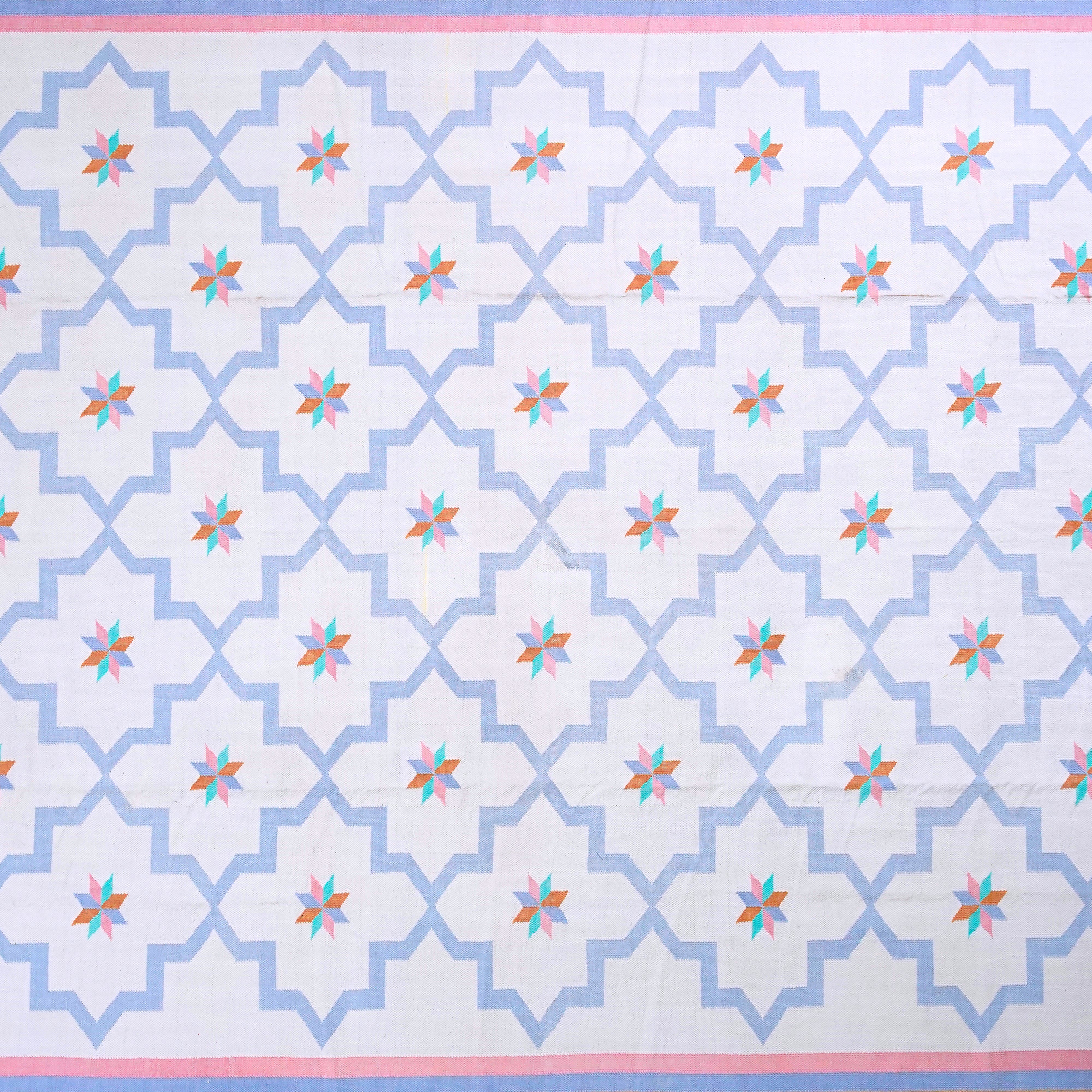 Jali Collection- Handwoven cotton Rug for home in Soft Blue and Orange