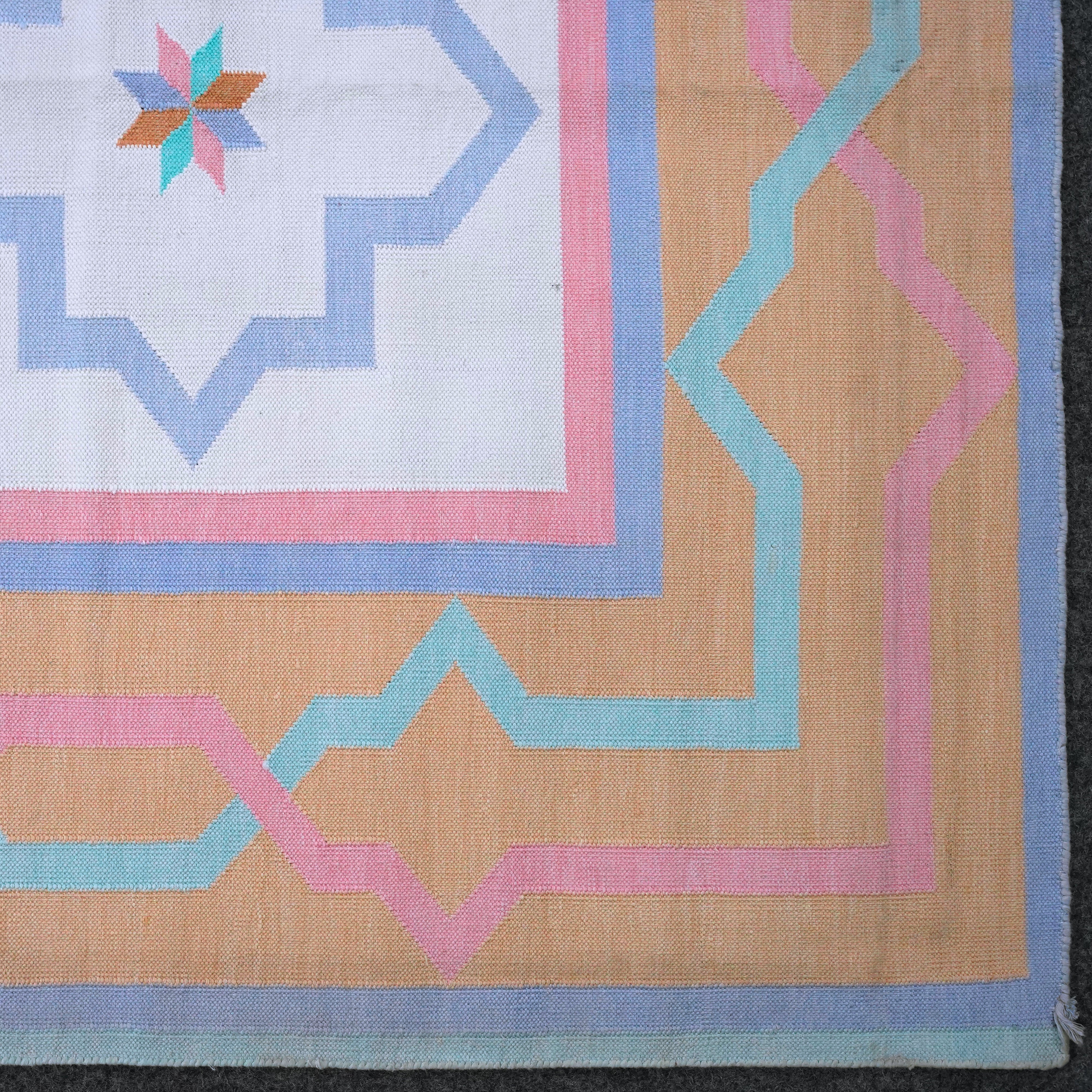 Jali Collection- Handwoven cotton Rug for home in Soft Blue and Orange